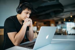 College student working on MacBook