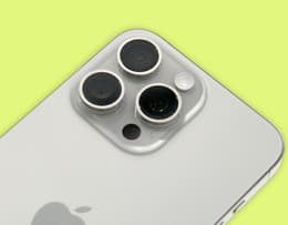 A pictur of the iPhone 15 Pro showing its compact size and camera layout.