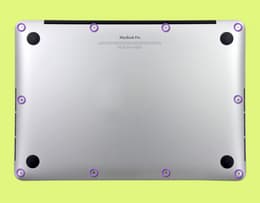 Image of back of a MacBook Pro showing pentalobe screws.