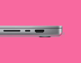 A close-up view of the two data ports on the MacBook Pro M2.