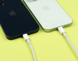 Lightning and USB-C charging ports on the iPhone 14 Plus and iPhone 15 Plus, respectively.