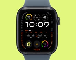 A close-up view of the Apple Watch SE 3 watch face displaying time and widgets.