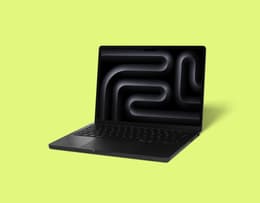 Apple MacBook Pro 14-inch M4 (2024) in a professional editing studio setup.
