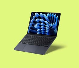 MacBook Air M4 laptop with the lid open, showing its sleek design and vibrant display.