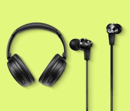 Picture of a headphone set next to an earphone set.