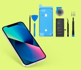 Image of an iPhone next to an iFixit battery replacement kit