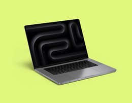Apple MacBook Pro 16-inch M3 Pro (2023) on a clean, minimalist studio desk with external displays.