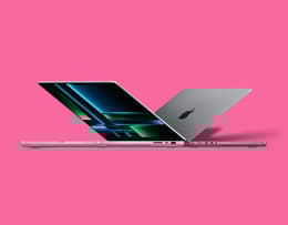 Side view of an open MacBook Pro M2 laptop.
